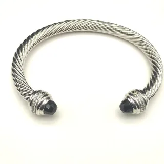 Pulsera de cable retorcido plata y negro con terminales de piedras facetadas