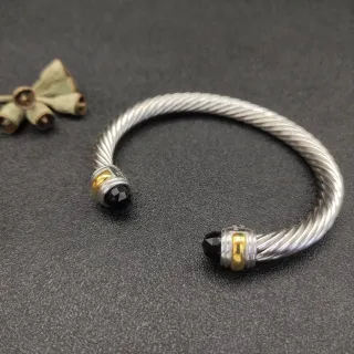 Pulseira de metal de cabo trançado bicolor prata e preto