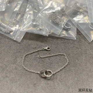 Pulsera de cadena de doble anillo entrelazado en plata