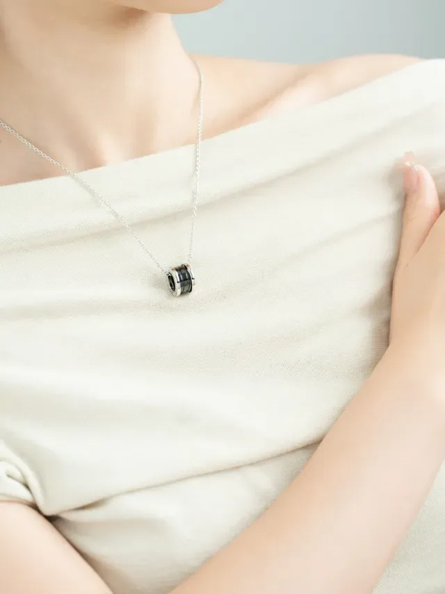 Silver-Tone and Black Multi-Ring Cylindrical Pendant Necklace 6