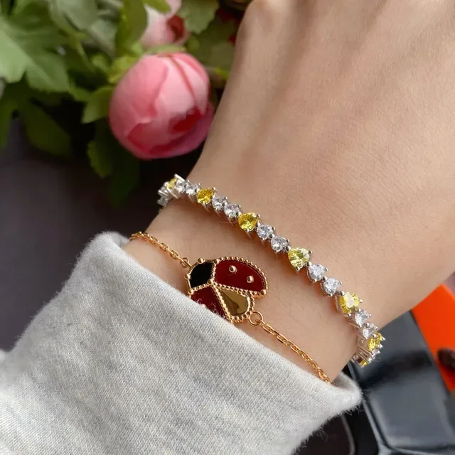 Silver-Tone Heart Stone Alternating Yellow and Clear Bracelet 9
