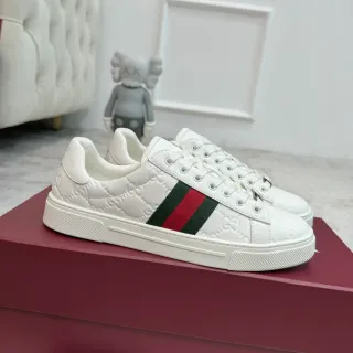 Gucci Ace أبيض منقوش GG ويب سترايب أسلوب حياة أحذية رياضية