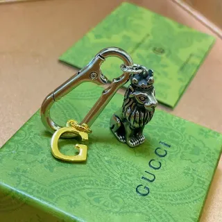 Gucci Crowned Lion حامل مفاتيح فضي ذهبي Charm G Logo سوار