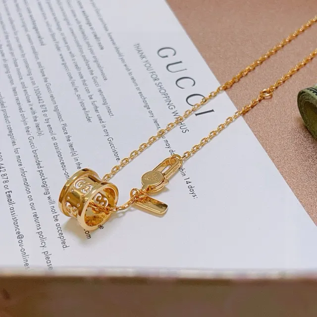 Gucci GG Marmont Gold-Tone Rotating Pendant Necklace 5