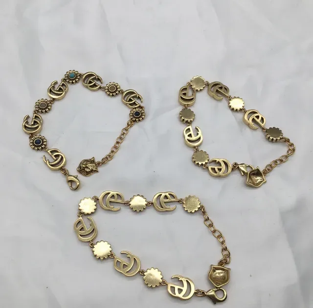 سوار Gucci ذهبي أزرق معدني Interlocking GG Links 4