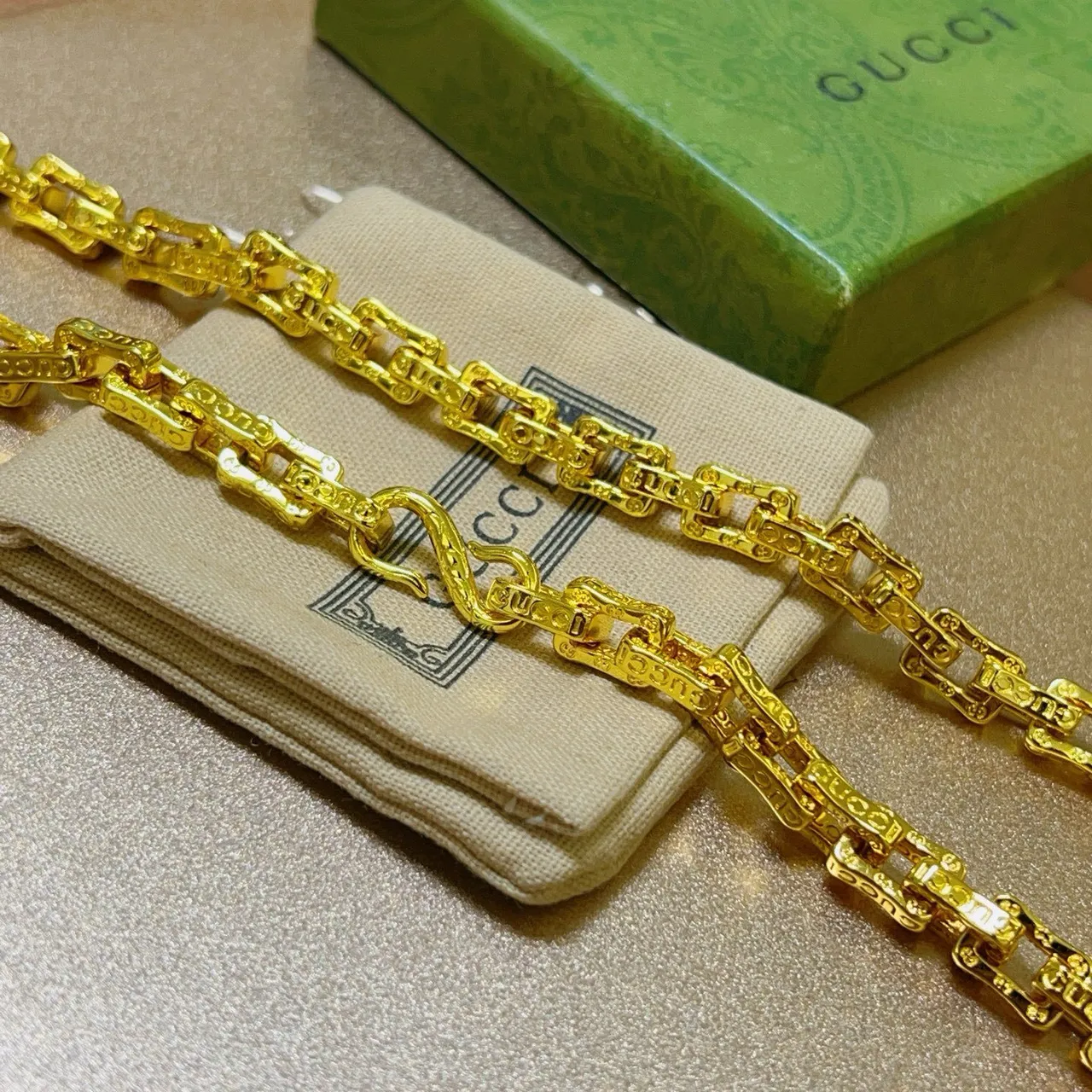 Gucci Gold-Tone Engraved Link Chain Necklace 9