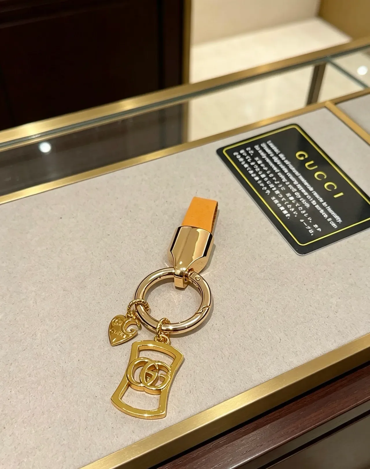 Gucci Interlocking GG Charm Keyring Gold Beige Metal Tan Leather Strap Bracelet 2