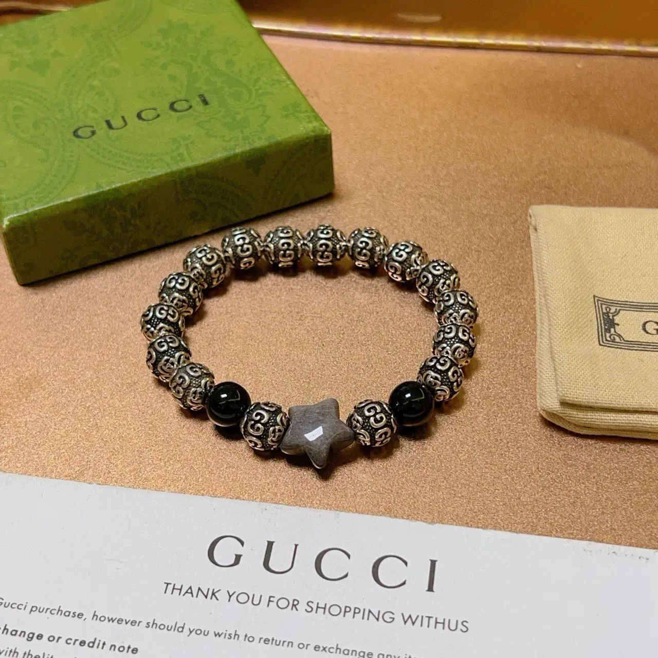 Gucci Ornate Scrollwork Metal and Black Stone Stretch Bracelet 2