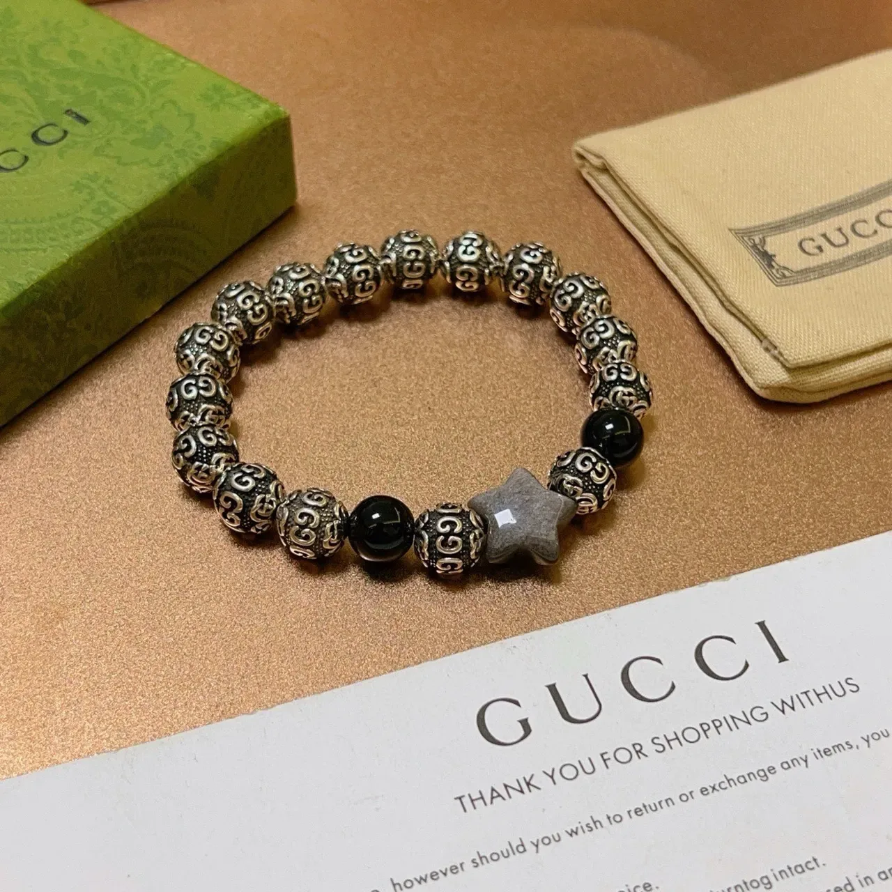 Gucci Ornate Scrollwork Metal and Black Stone Stretch Bracelet 3