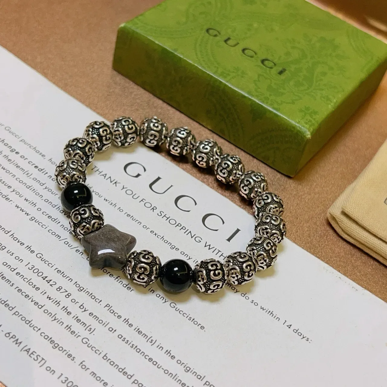 Gucci Ornate Scrollwork Metal and Black Stone Stretch Bracelet 5