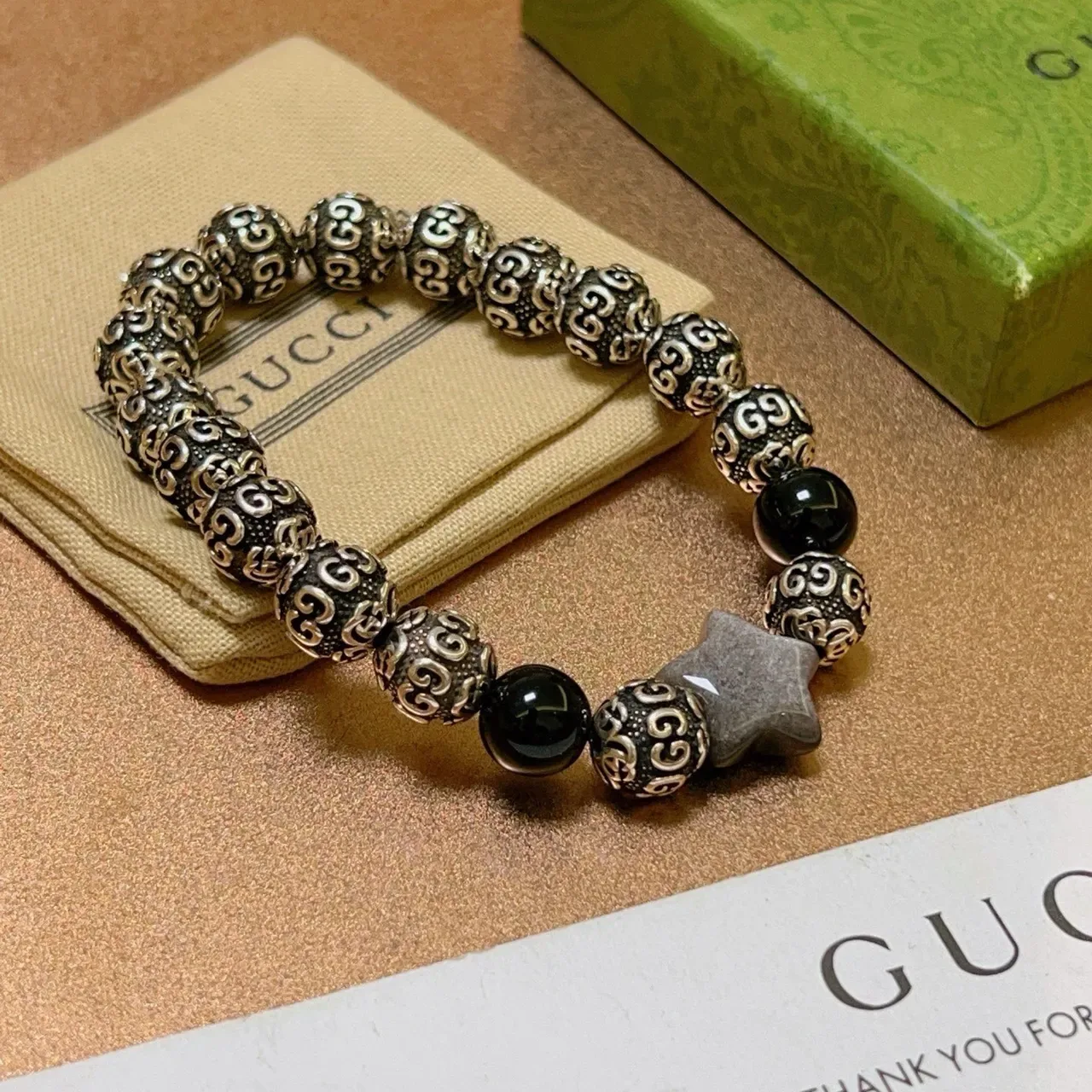 Gucci Ornate Scrollwork Metal and Black Stone Stretch Bracelet 6