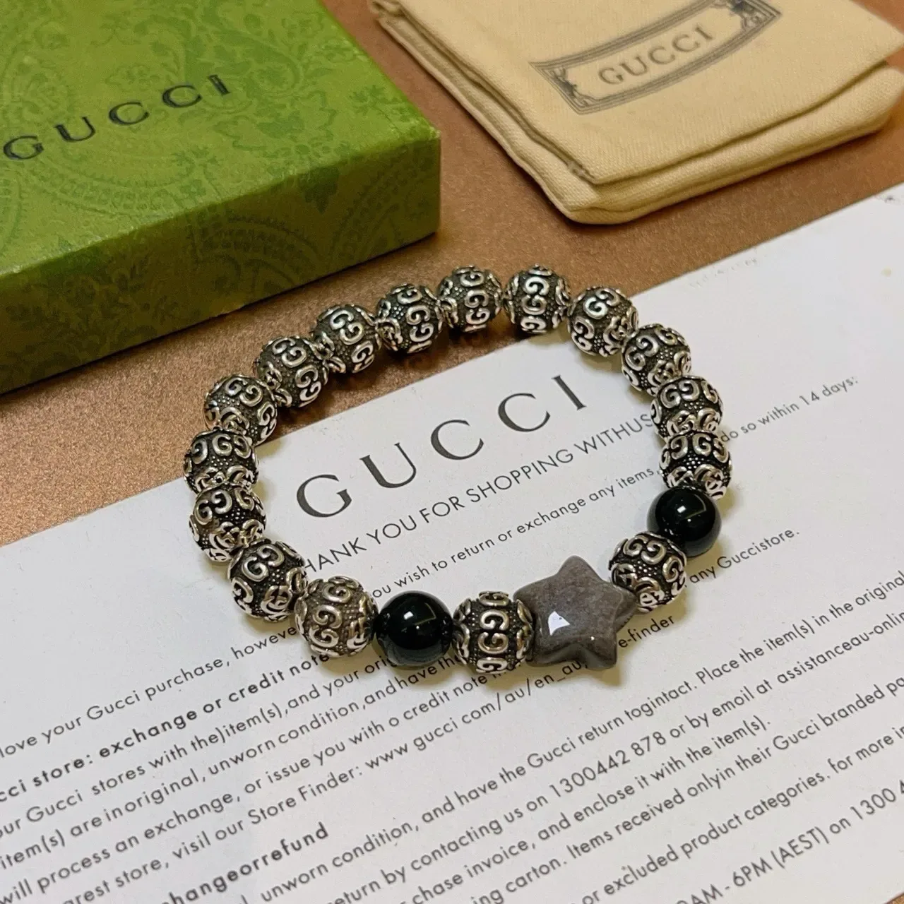 Gucci Ornate Scrollwork Metal and Black Stone Stretch Bracelet 9