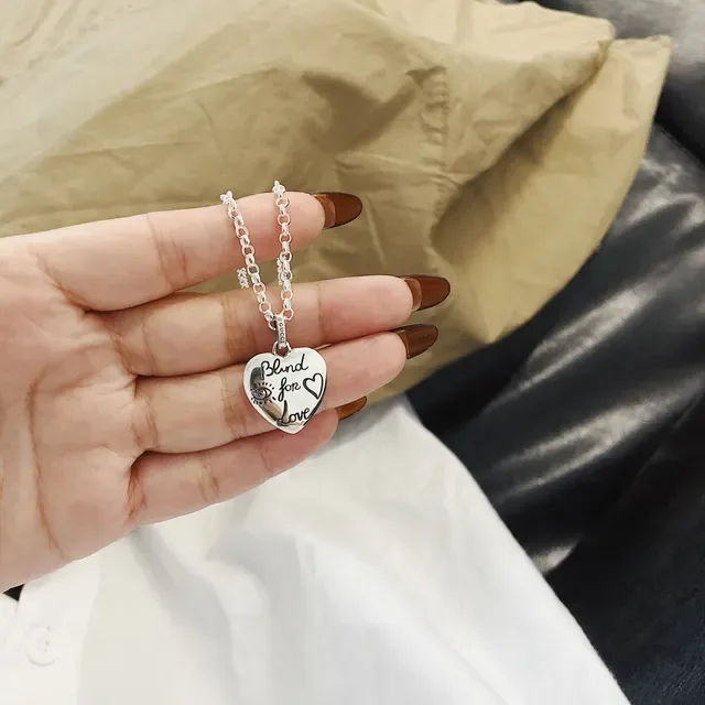 Gucci Silver Black Engraved Charms Metal Necklace 6
