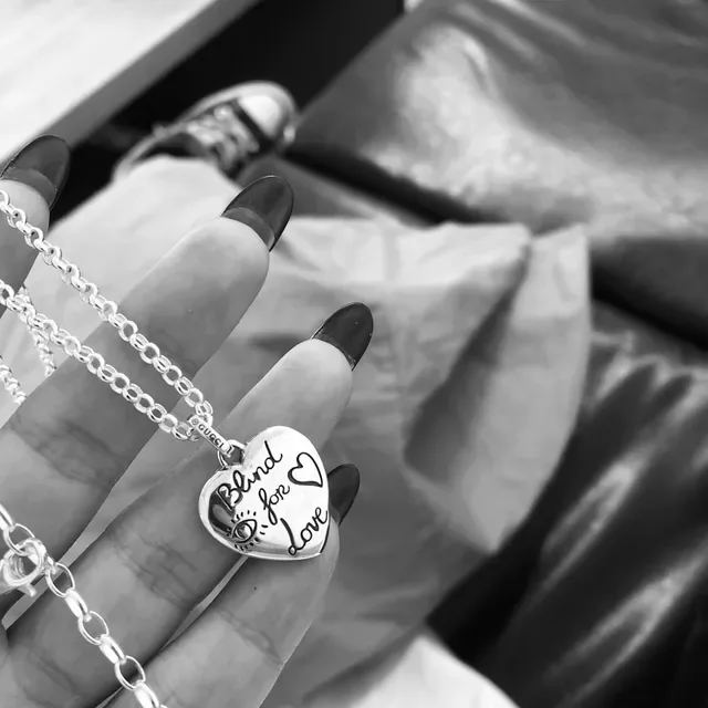 Gucci Silver Black Engraved Charms Metal Necklace 7