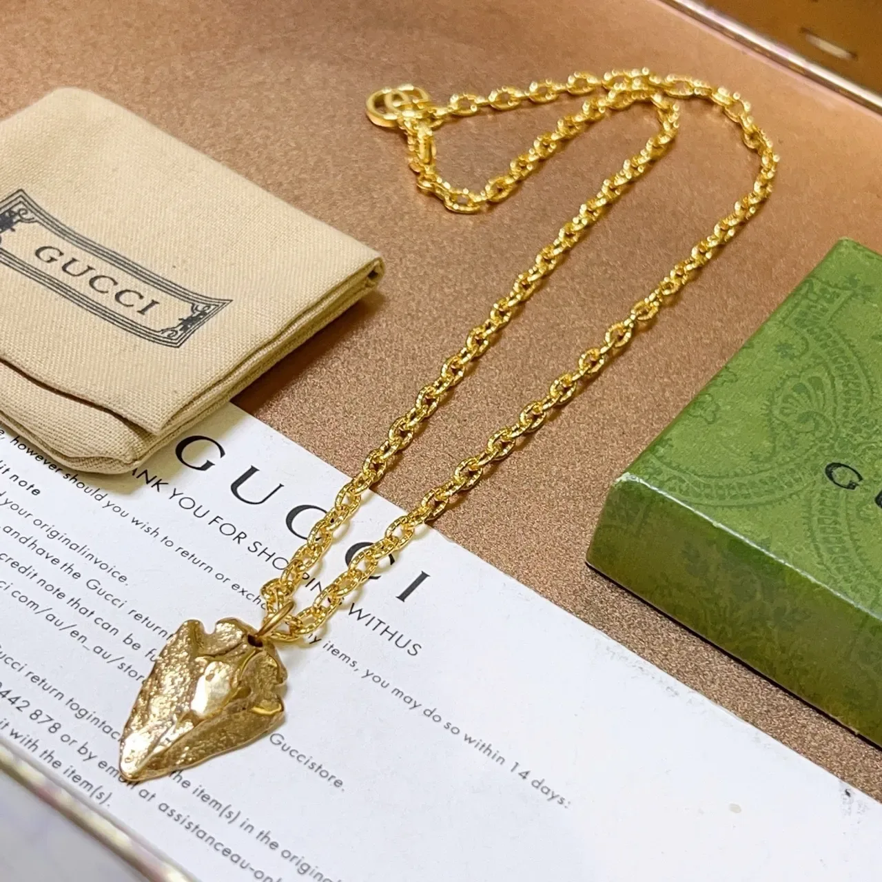 Gucci Textured Leaf Pendant Gold Chain Necklace 3