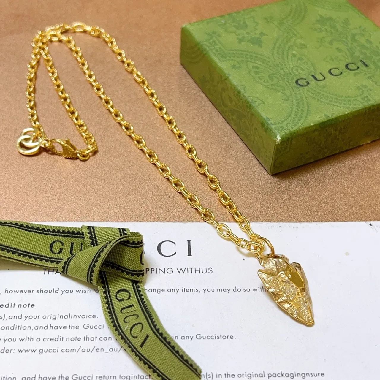 Gucci Textured Leaf Pendant Gold Chain Necklace 4