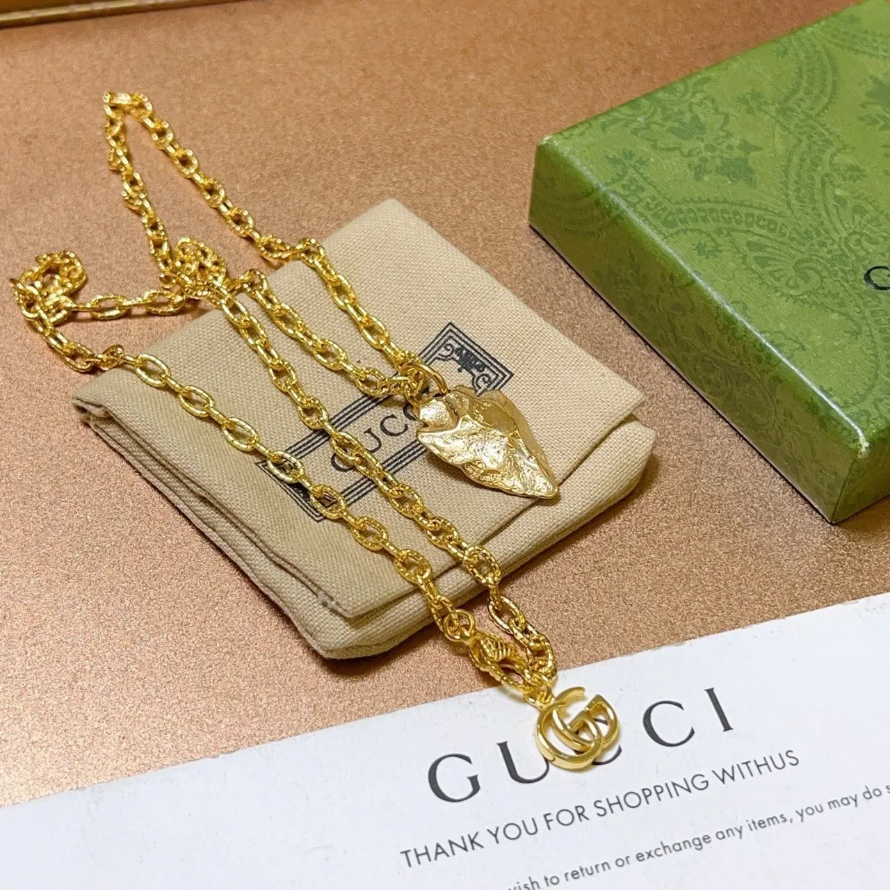 Gucci Textured Leaf Pendant Gold Chain Necklace 9