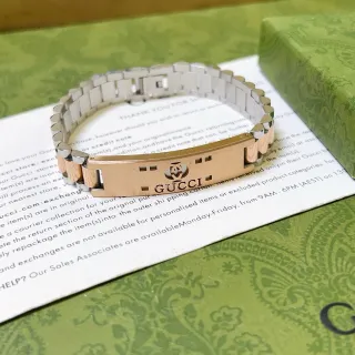 Gucci Pulsera de eslabones de dos tonos con logo grabado