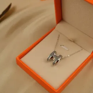 Hermès Silver Orange Open H-Shaped Pendant Polished Metal Necklace