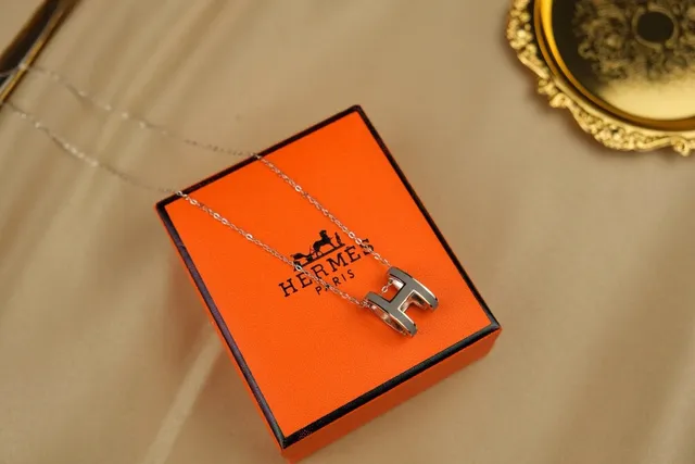 Hermès Silver Orange Open H-Shaped Pendant Polished Metal Necklace 6