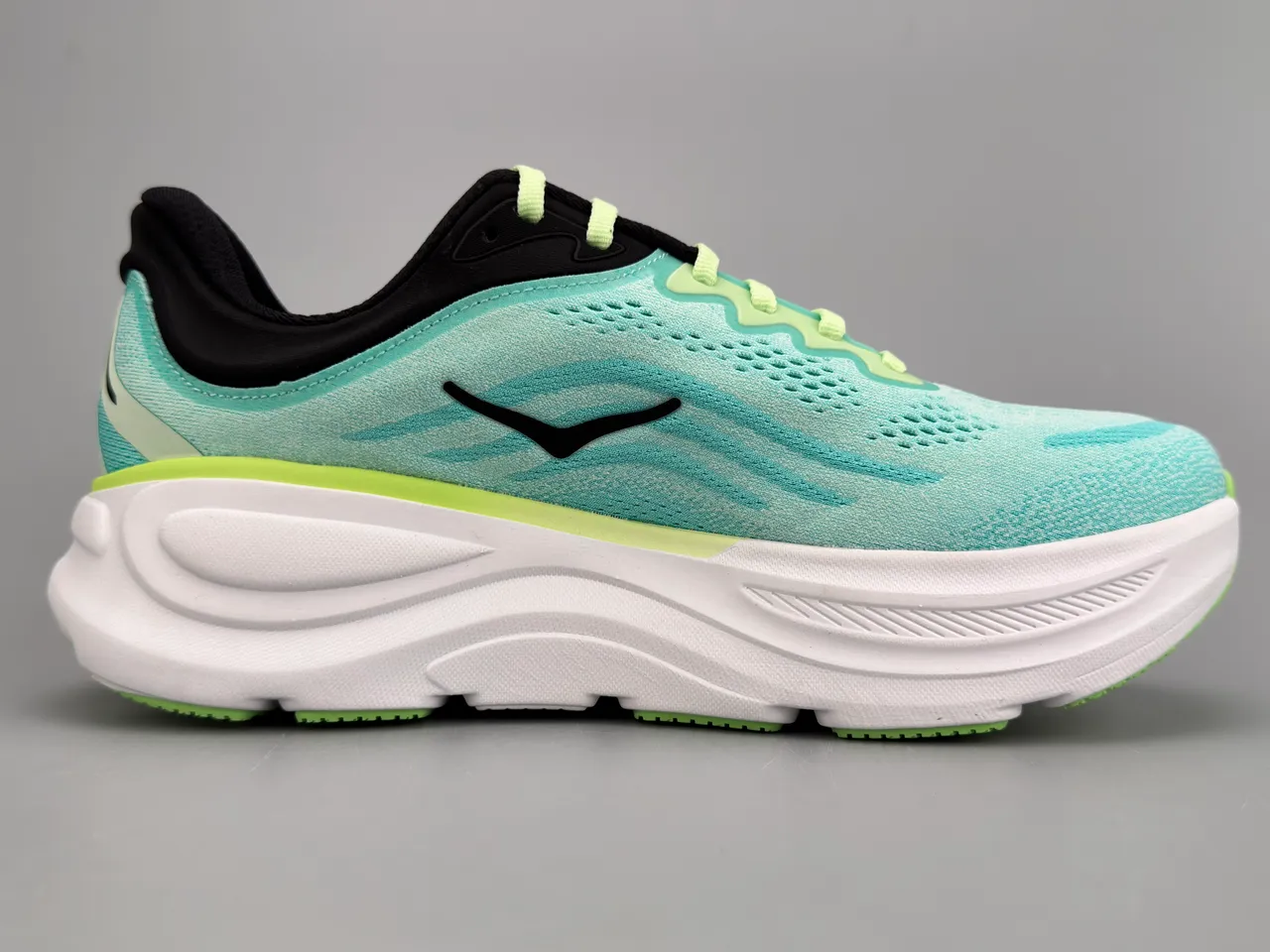 Hoka Tênis de corrida com upper de knit azul verde sola média espessa branca 10