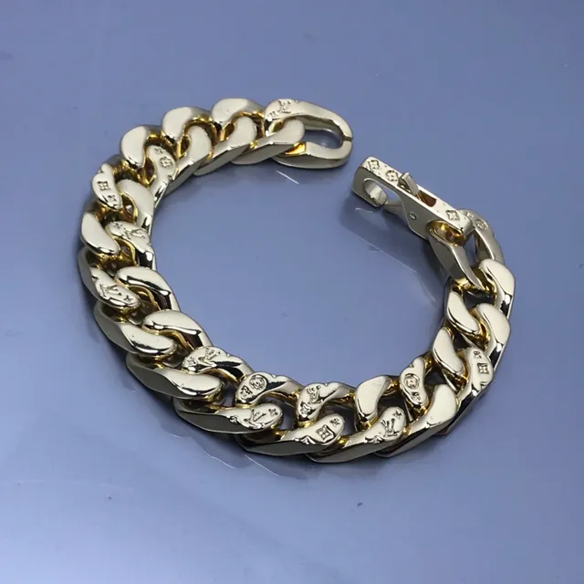 Louis Vuitton Chain Reaction Monogram Star Curb-Link Gold-Tone Bracelet 4