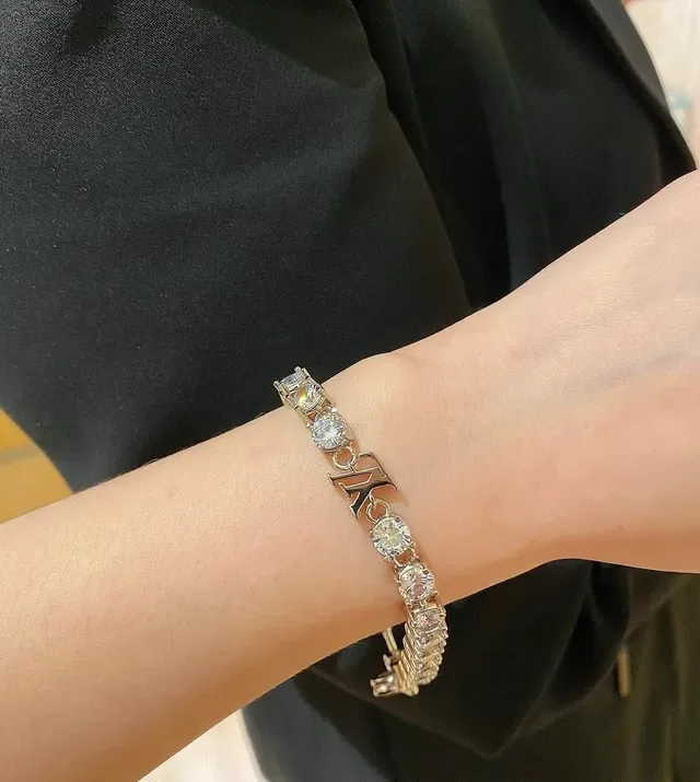 Louis Vuitton Crystal-Embellished LV Monogram Charm Bracelet 8