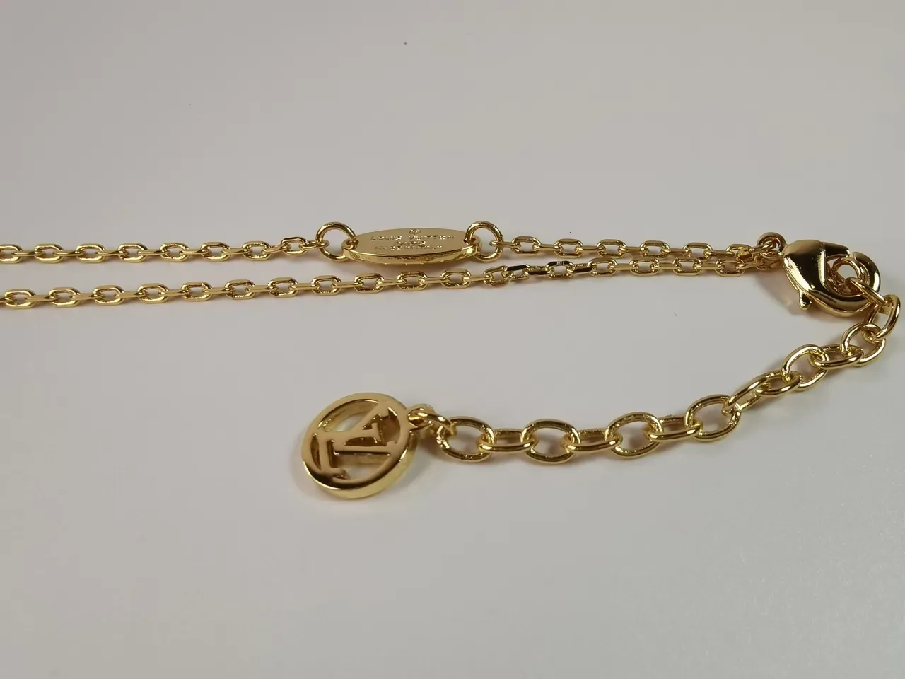 Louis Vuitton Gold-Tone Crystal V Motif Necklace 3