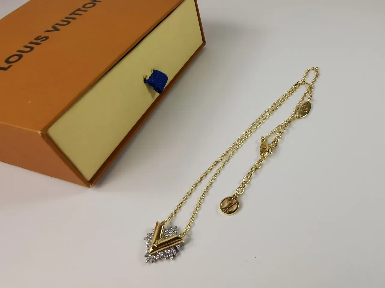 Louis Vuitton Gold-Tone Crystal V Motif Necklace 6