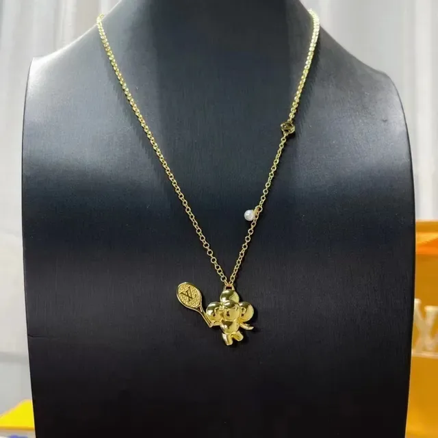 Louis Vuitton Gold-Tone Tennis Racket Floral Pendant Necklace 2