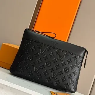 Louis Vuitton Rectangular Silhouette Black Embossed Monogram Leather Wristlet