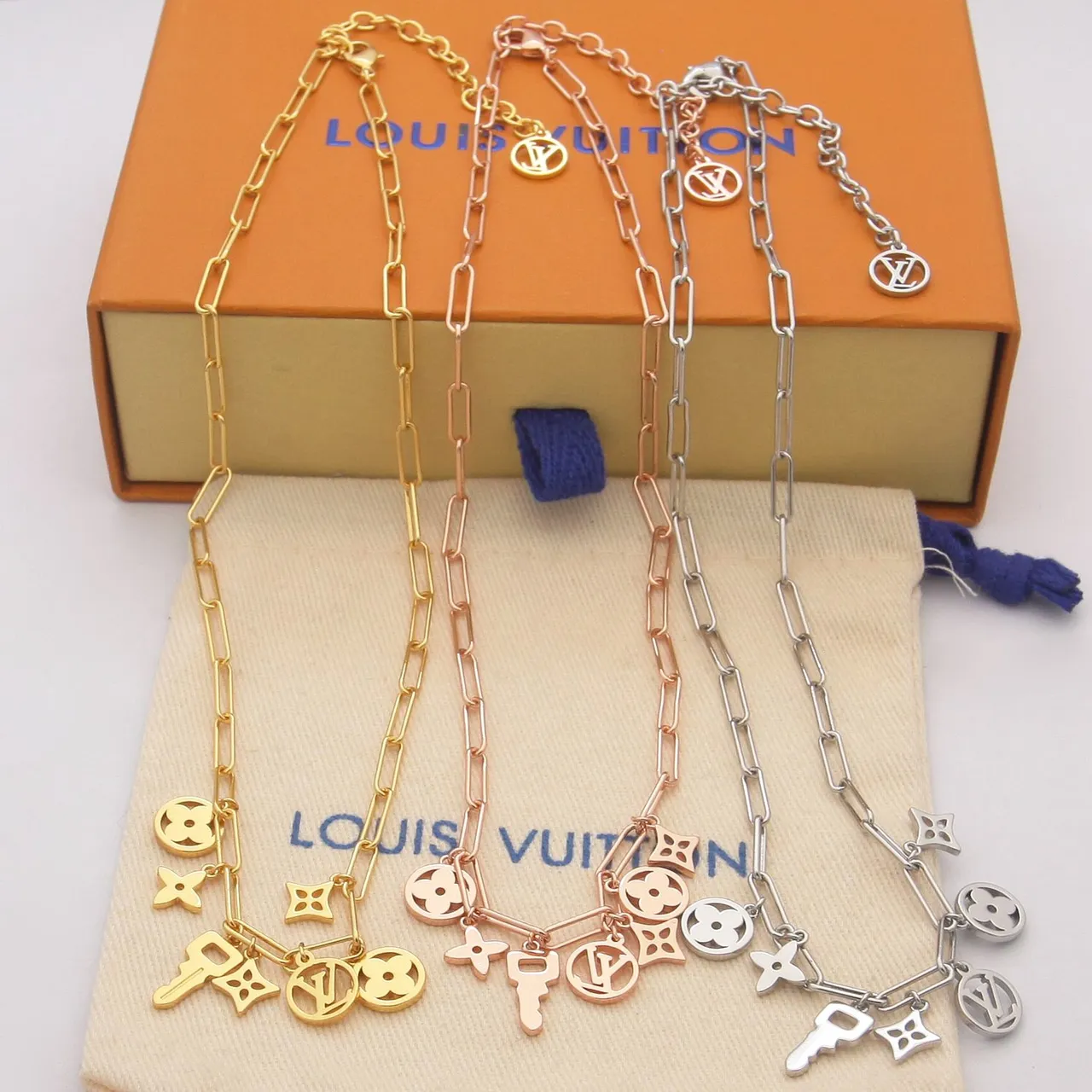 Louis Vuitton Silver Beige Paperclip-Link Chain Dangling Monogram Charms Necklace 6