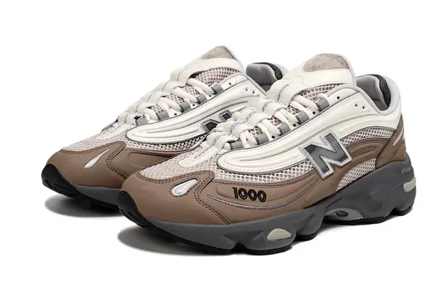 New Balance Tênis chunky bege cinza com upper de malla layered e sintético midsole multi-densidade 2
