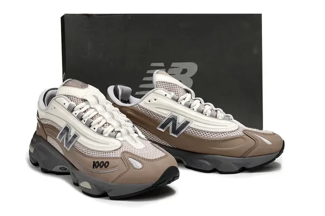 New Balance Tênis chunky bege cinza com upper de malla layered e sintético midsole multi-densidade 5