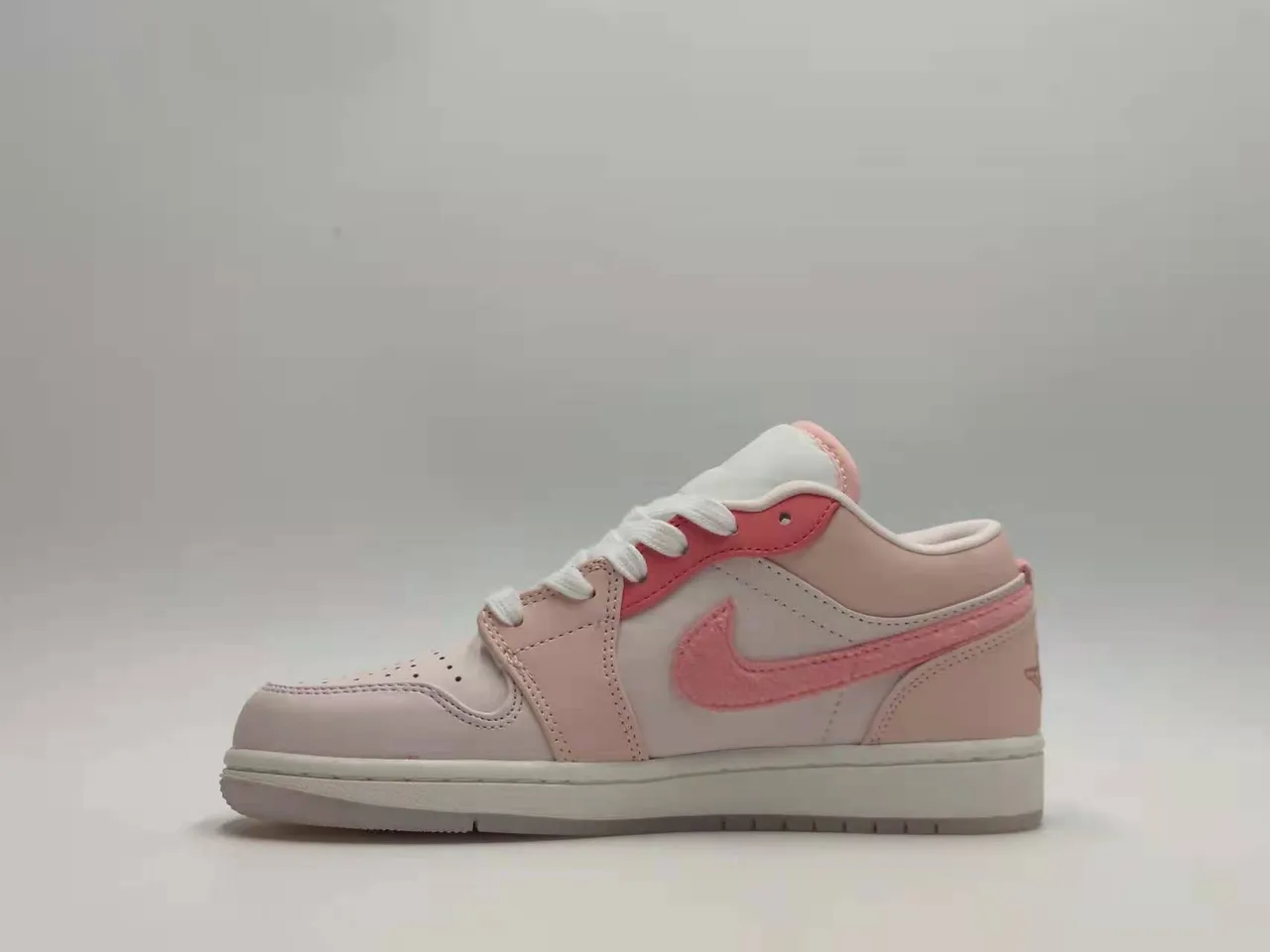 Nike Air Jordan 1 Low Pink and White Lifestyle Sneakers 6