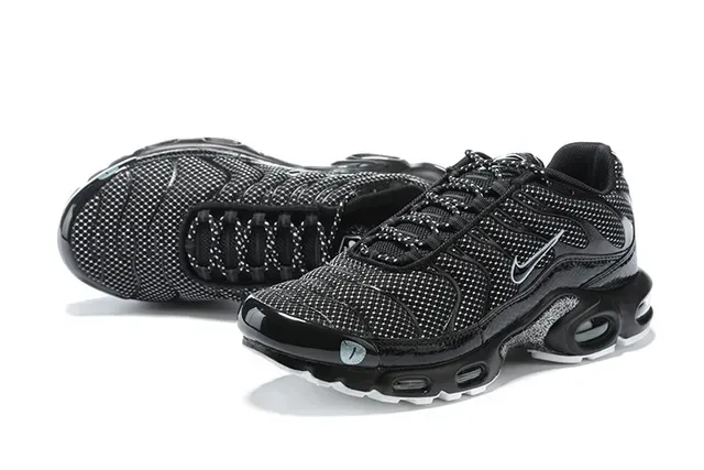 Nike Air Max Plus Black and White Lifestyle Sneakers 5
