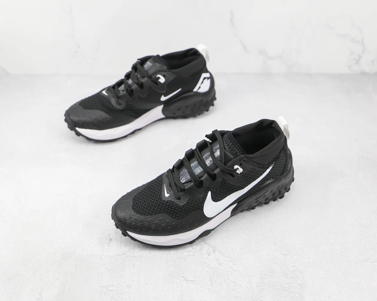 Nike Black and White Trail-Style Running Shoes 4