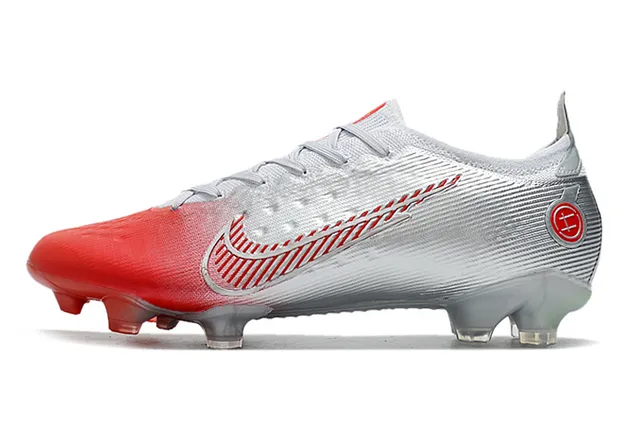 Nike Sapatos de futebol dourados pretos com overlay metálico de malha base para solo firme 12