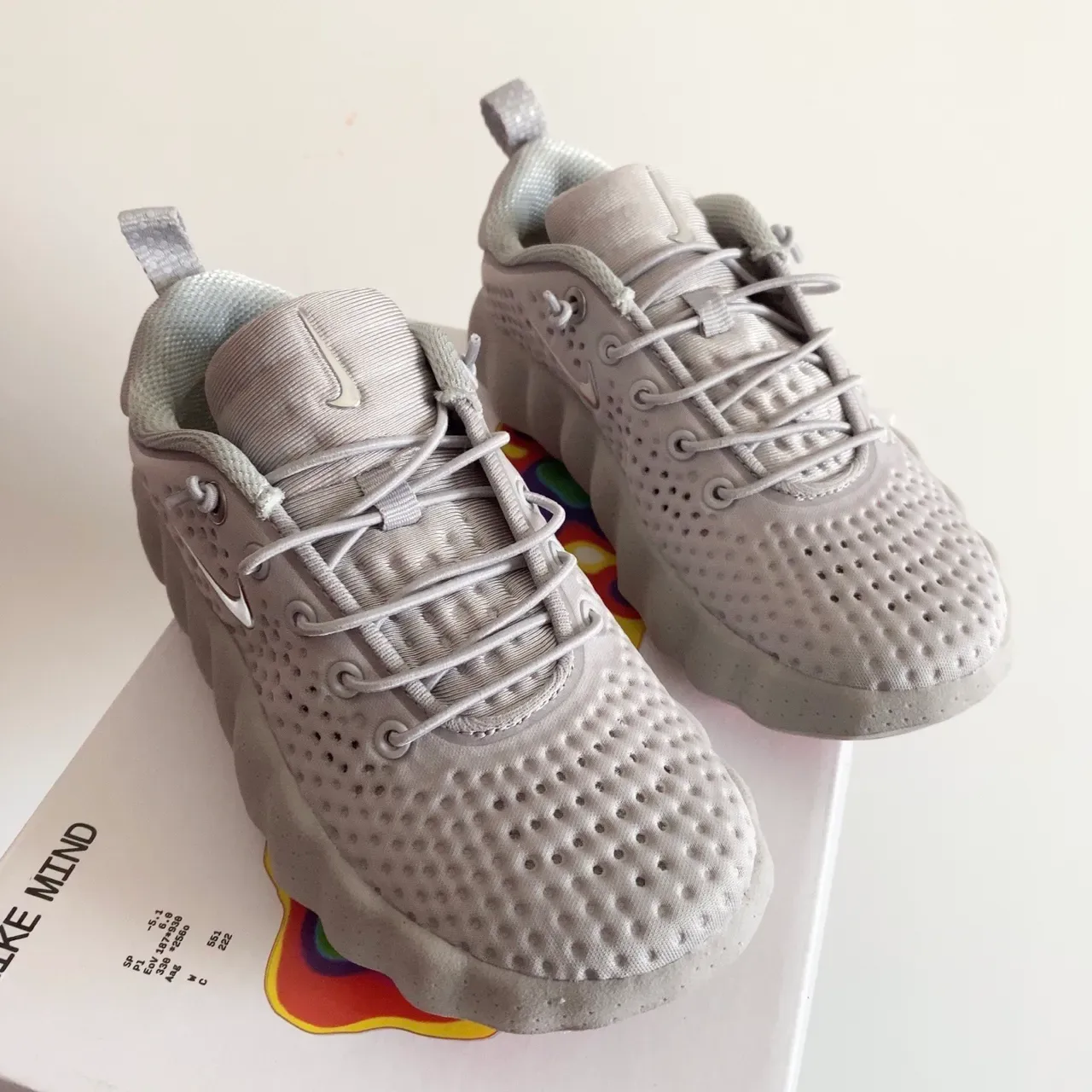 Nike Gray White Perforated Knit Upper Sculpted Wavy Midsole Lifestyle Sneakers 21