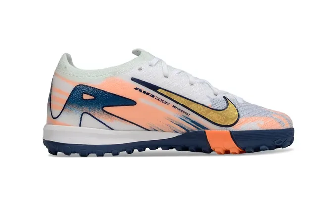 Chaussures de football Nike Orange Navy avec upper en knit et overlay d'impression graphique pour turf 7