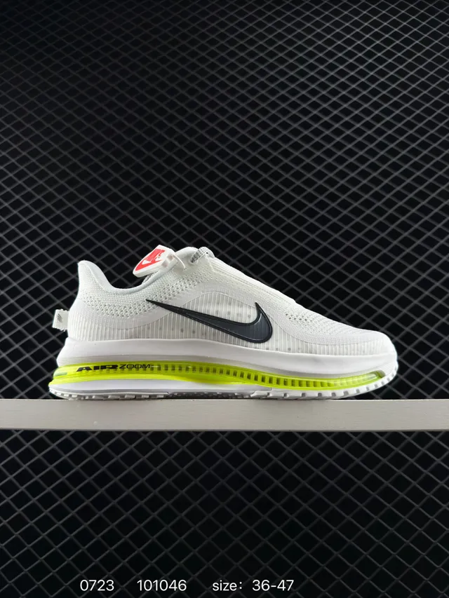 Nike Pegasus Premium Zapatos de correr blancos y verdes con upper de malla y unidad Air Zoom visible 6