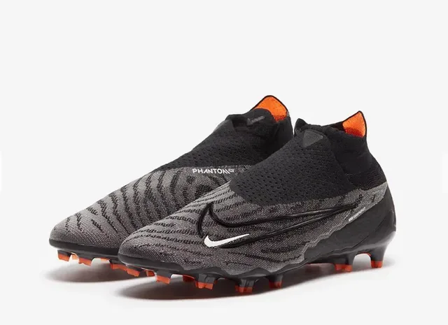 Nike Phantom GT أسود/برتقالي عالي القطع ملائمة الجوارب السطح العلوي أرض صلبة أحذية كرة قدم 2