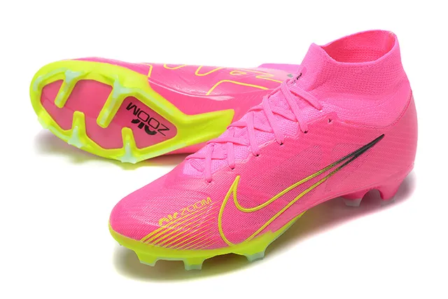 Nike Botas de fútbol rosa y amarillo de alto corte en knit con cordones asimétricos para terreno firme 7