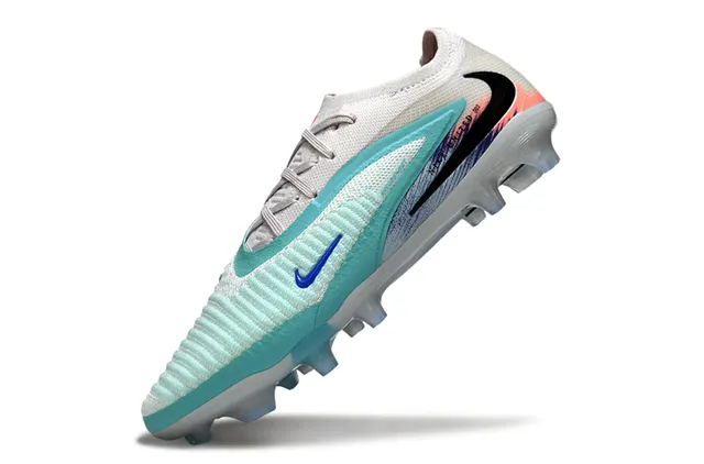 Nike Zapatos de fútbol con upper de tejido blanco y azul, bajo, estilo botín, para terreno firme 3