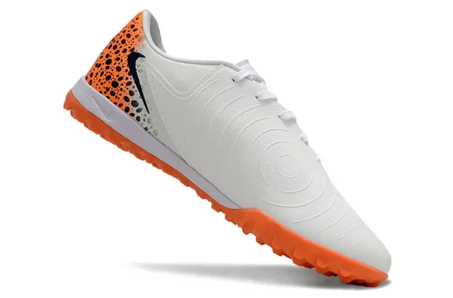 Zapatillas de fútbol Nike low-cut blancas y naranjas upper sintético panel de talón speckled para turf 2