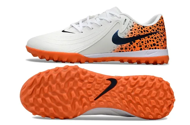 Zapatillas de fútbol Nike low-cut blancas y naranjas upper sintético panel de talón speckled para turf 6