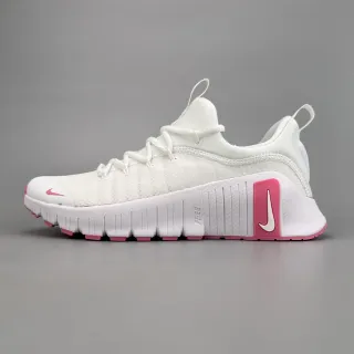 Nike Chaussures de course blanches et roses avec upper en maille segmenté et midsole flex-groove segmenté