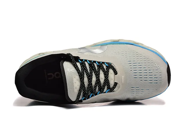 On Cloudmonster cinza claro azul teal tênis de corrida 2
