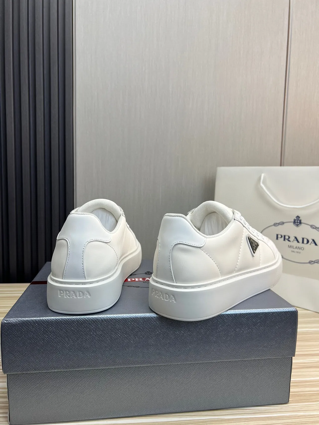 Prada Cloudbust White Black Leather-Like Upper Triangular Metal Logo Patch Lifestyle Sneakers 2