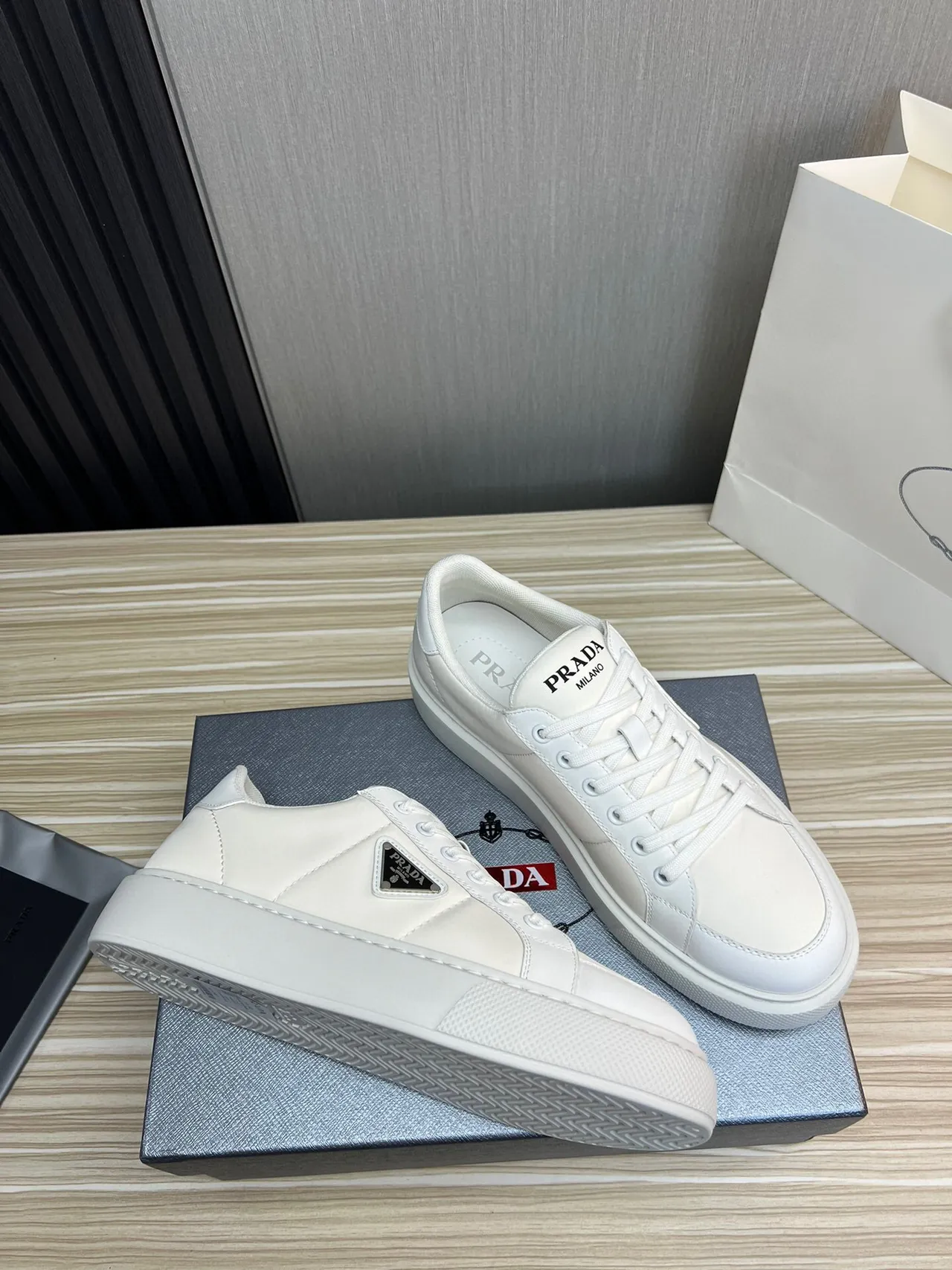 Prada Cloudbust White Black Leather-Like Upper Triangular Metal Logo Patch Lifestyle Sneakers 3